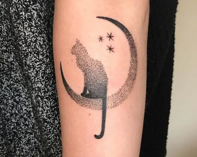 small black dots black cat on a crescent moon tattoo on arms