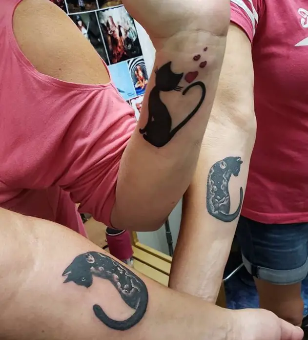 three designs of black cat tattoo on arms