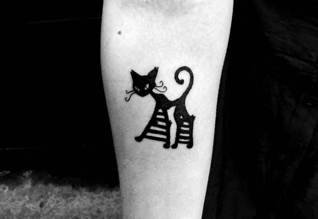 creative black cat tattoo on arms