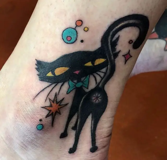 stylish and colorful black cat tattoo on the ankle