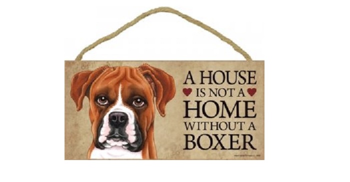Wooden door sign that reads - A house is not a home without a boxer