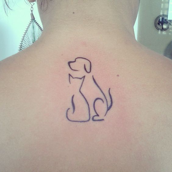 outline of sitting dog and cat tattoo on the back