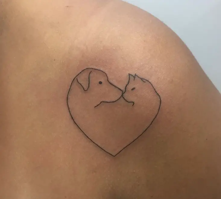 outline dog and cat forming a heart tattoo on the shoulders