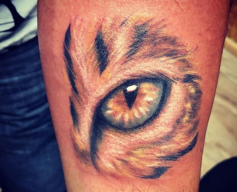 3D Cat Eye tattoo on the forearm