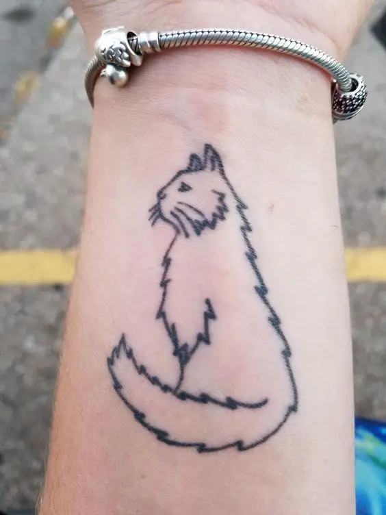 outline of sitting furry cat tattoo on the wrist