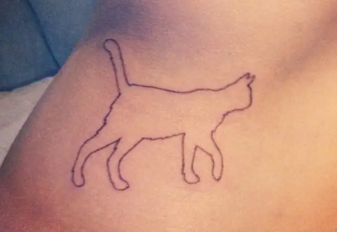 outline of a walking cat tattoo