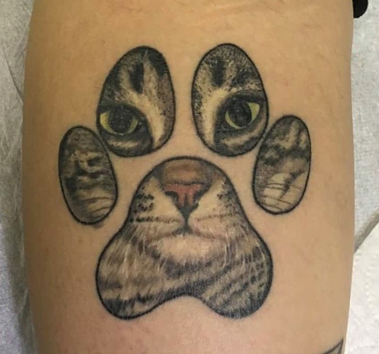 Cat Paw Print with a cats face tattoo