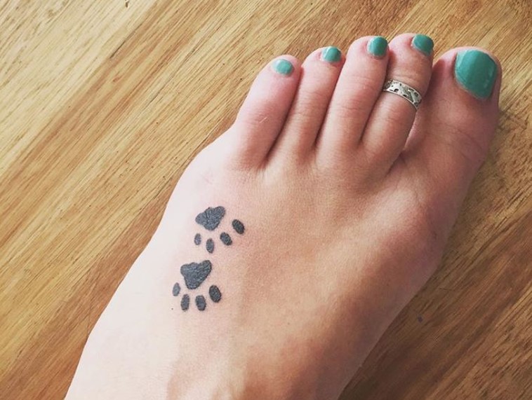 two Cat Paw Prints tattoo on feet