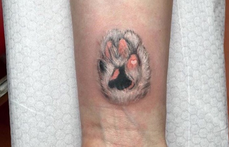 3D Cat Paw Print tattoo on the wrist