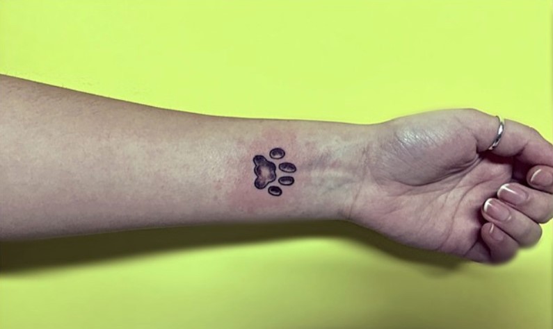 Cat Paw Print tattoo on the wrist