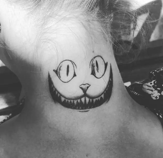 simple black and gray Cheshire Cat tattoo on the neck
