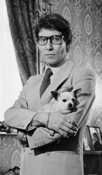old photo of Yves Saint Laurent with a Chihuahua in his arms