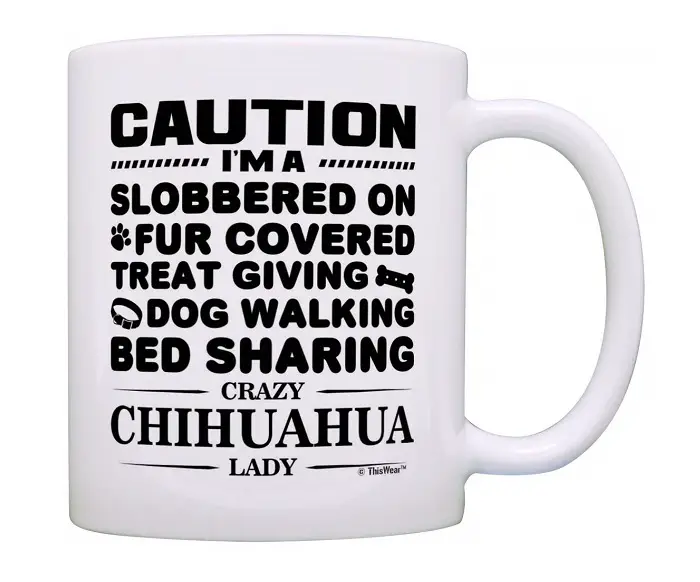 white coffee mug printed with words - Caution, I'm a slobbered on, fur covered, treat giving, dog walking, bed sharing crazy Chihuahua lady