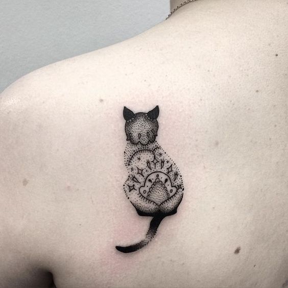 artistic stars cat tattoo on the back