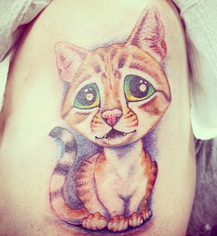 3D animated orange cat tattoo on the shoulder