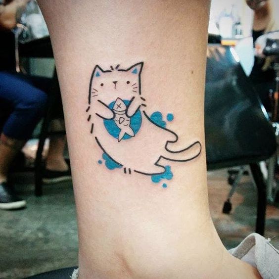 outline of a cat holding a fish with blue blobs tattoo on the leg