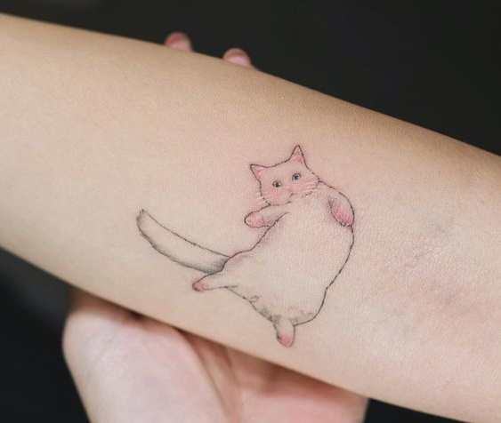 outline of a cat minimalist tattoo on the forearm