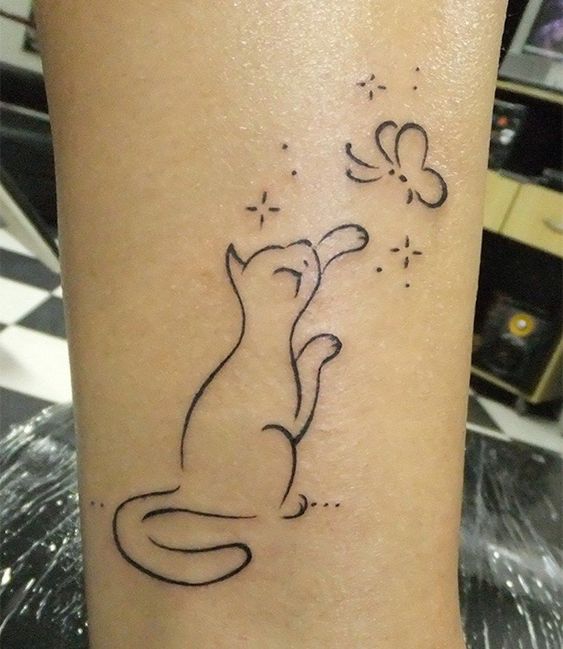 outline of a cat catching a butterfly tattoo