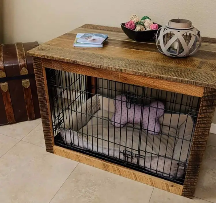 wooden decorative in door dog crate with things on top