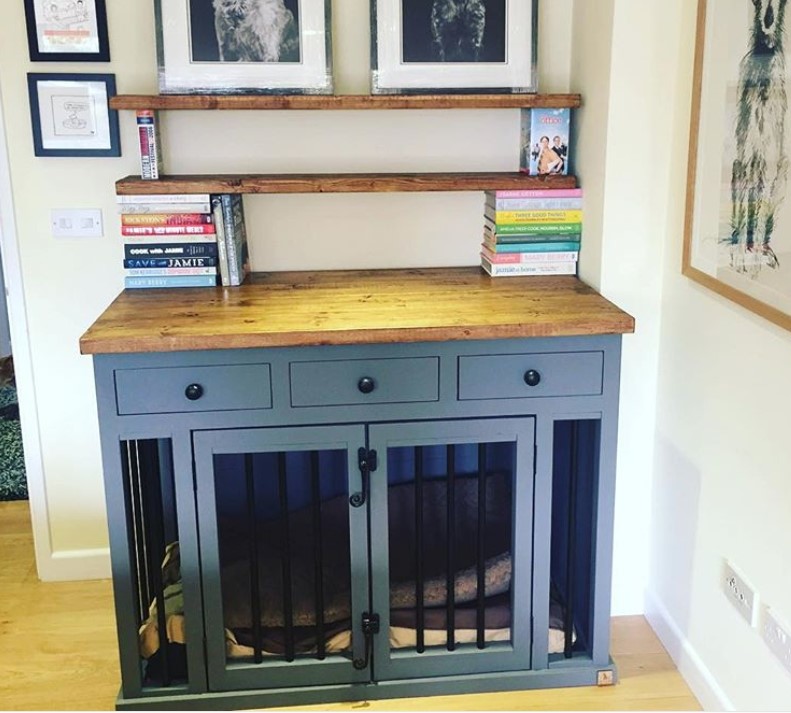 wooden furniture dog crate with books on top