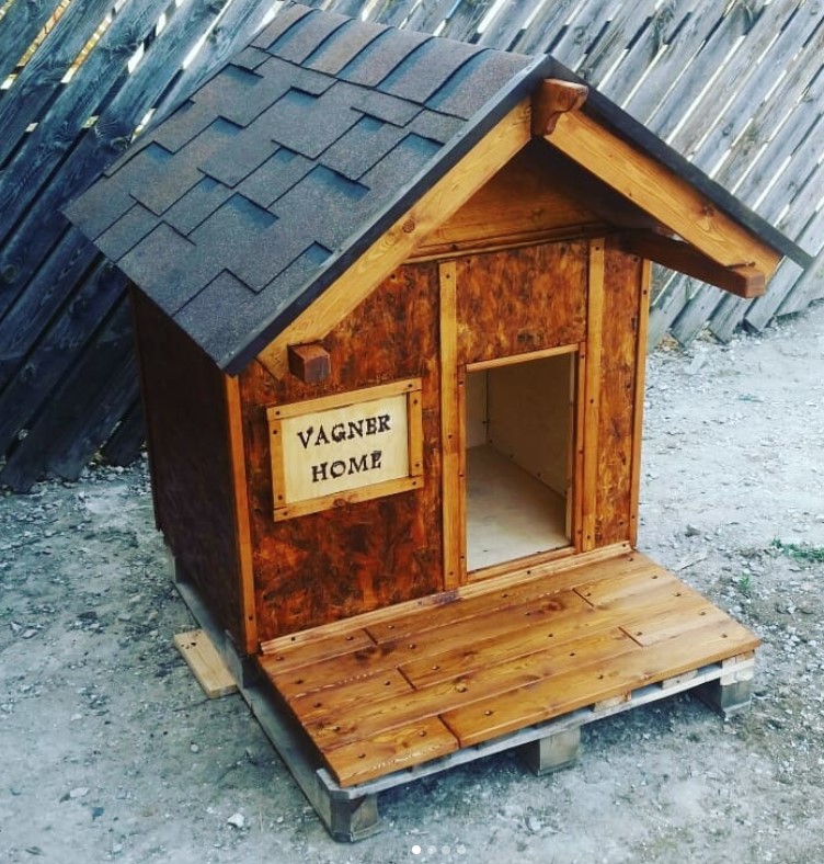 A wooden dog house