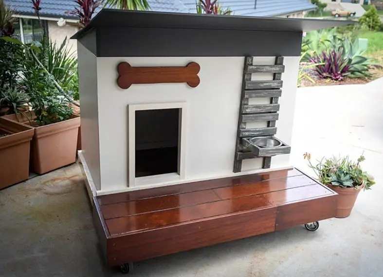 A white and brown dog house