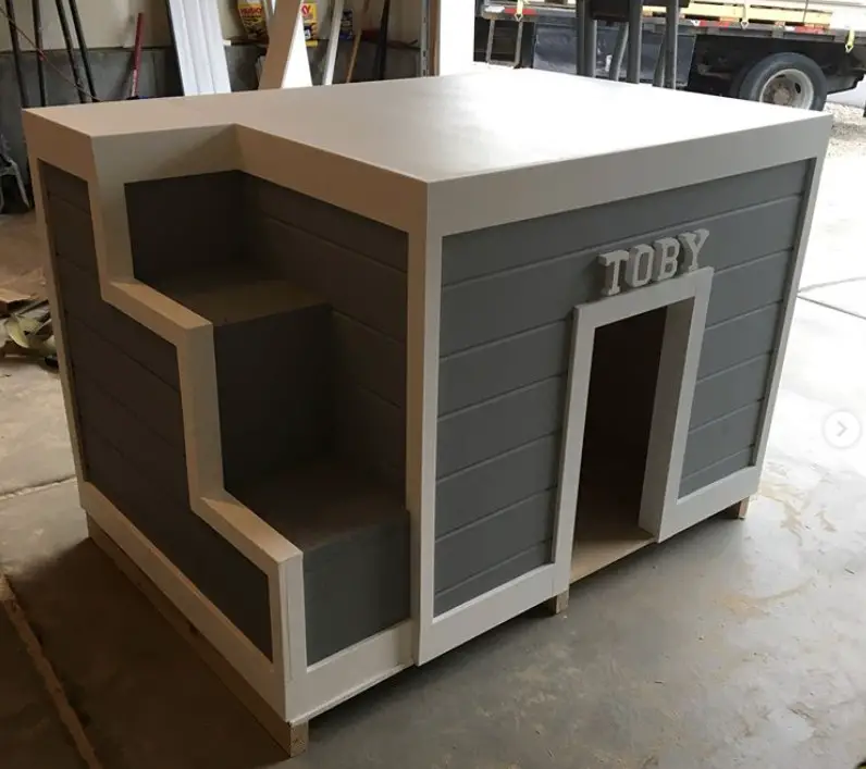 A gray and white modern dog house
