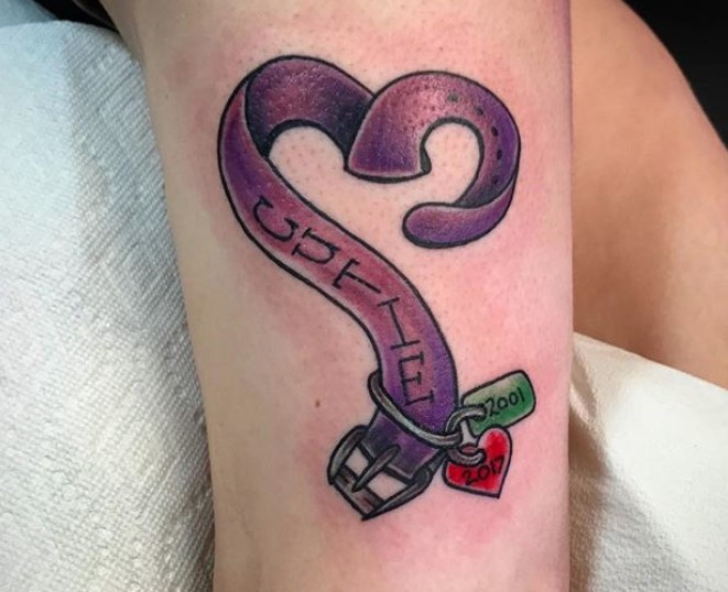 purple collar with name tattoo