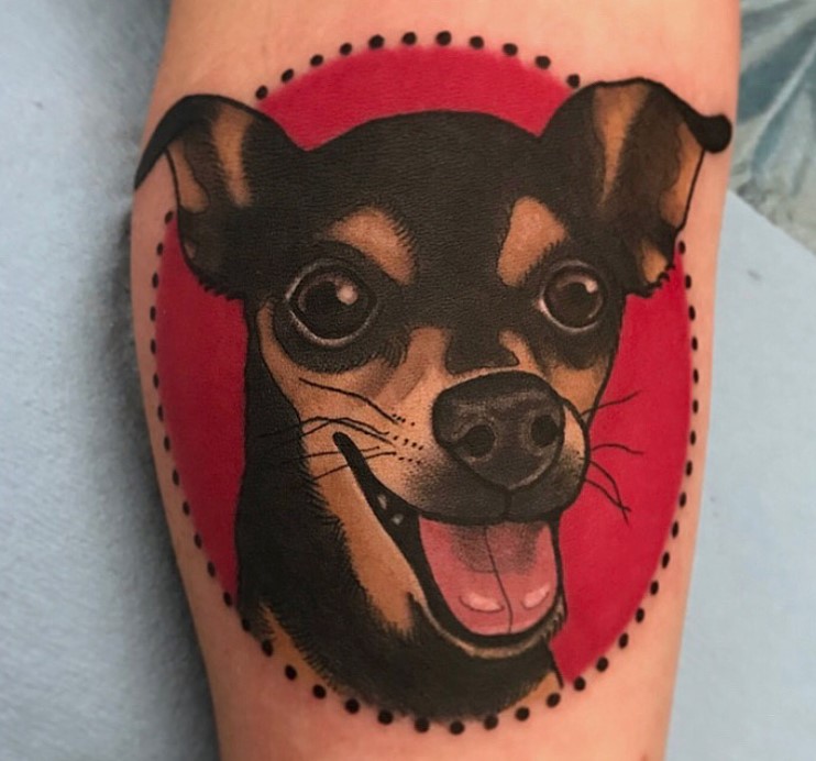 face of dog with red circle background tattoo