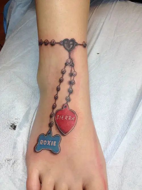 necklace with pet tag tattoo around the leg