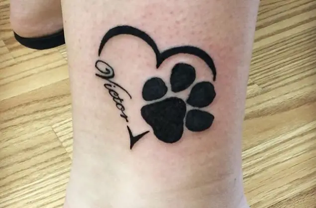 black paw print in heart outline with 