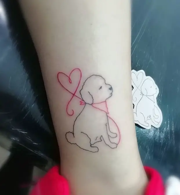 Bichon Frise outline with a red heart string tattoo on the ankle