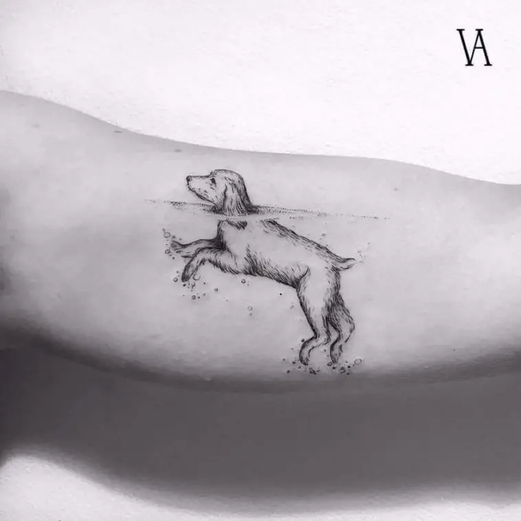 3D swimming dog with its body in the water outline tattoo on the biceps