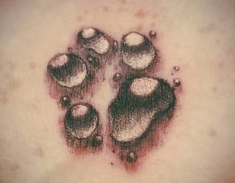 3D paw print tattoo