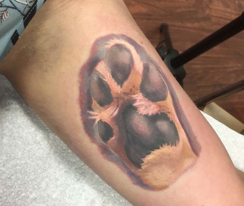 animated paw print tattoo