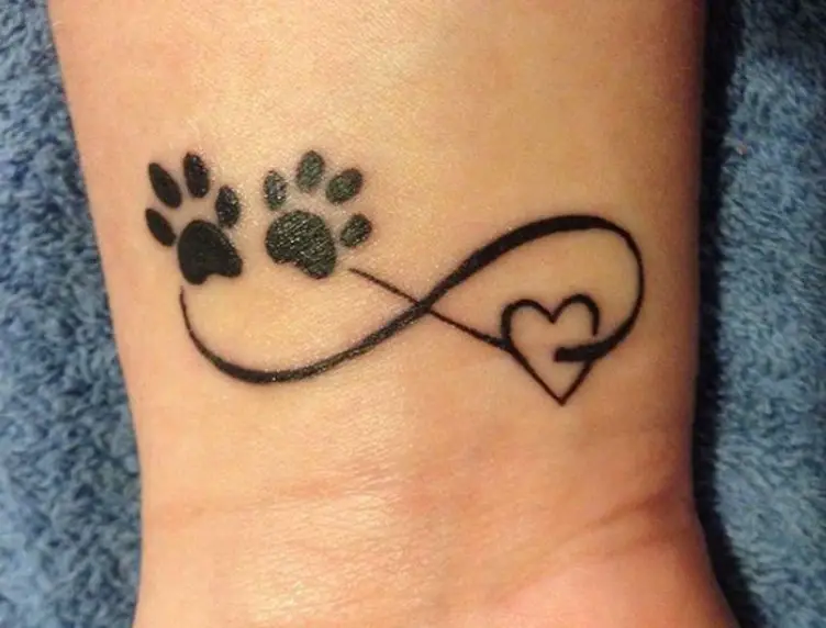 paw tattoo with infinity sign and heart
