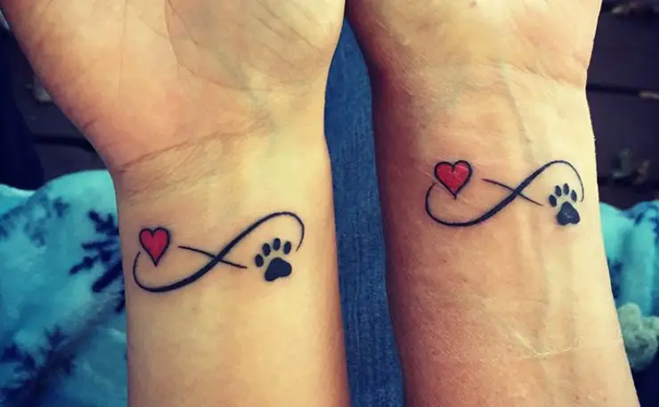 couple or bff indinity sign and paw print and heart tattoo