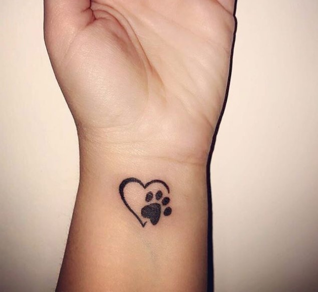 heart paw print tattoo on wrist