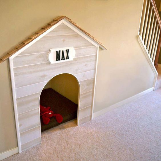 mini dog house below the stairs