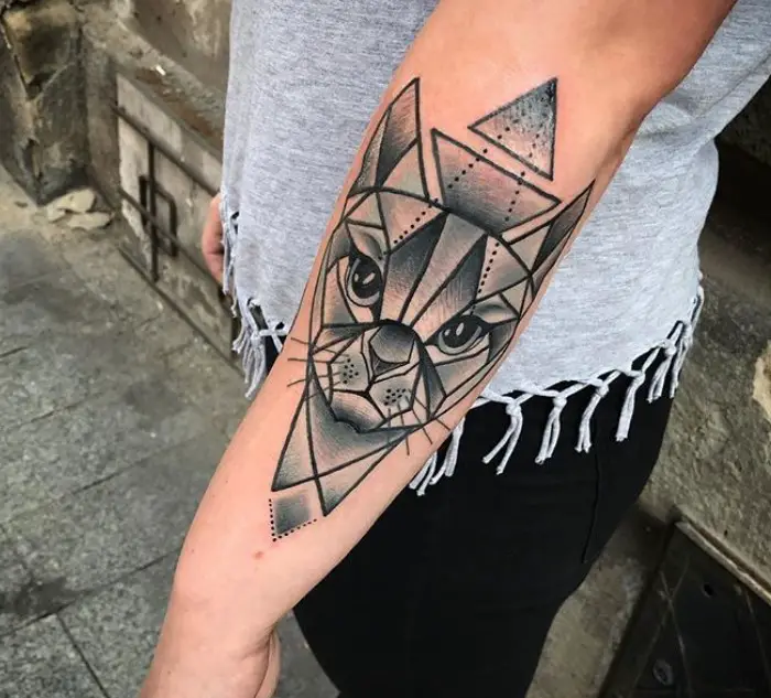Geometric face of a Cat Tattoo on the arm