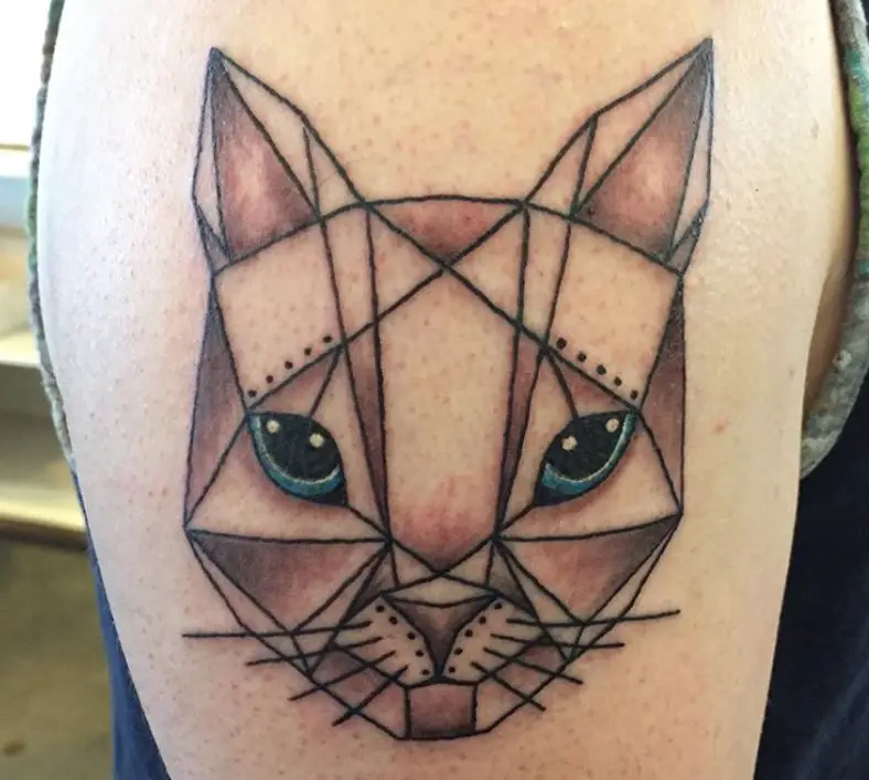 Geometric face of a Cat Tattoo on the shoulder