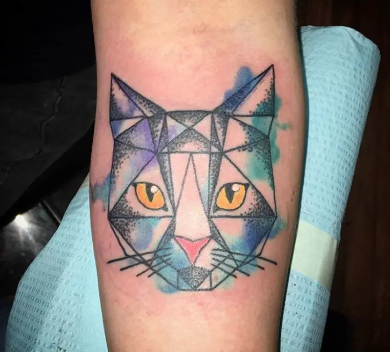 Geometric face of a Cat Tattoo on the forearm