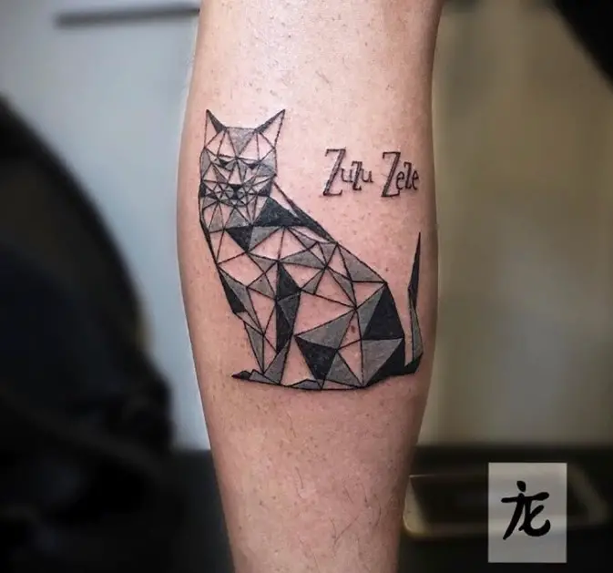 A sitting Geometric Cat Tattoo on the leg
