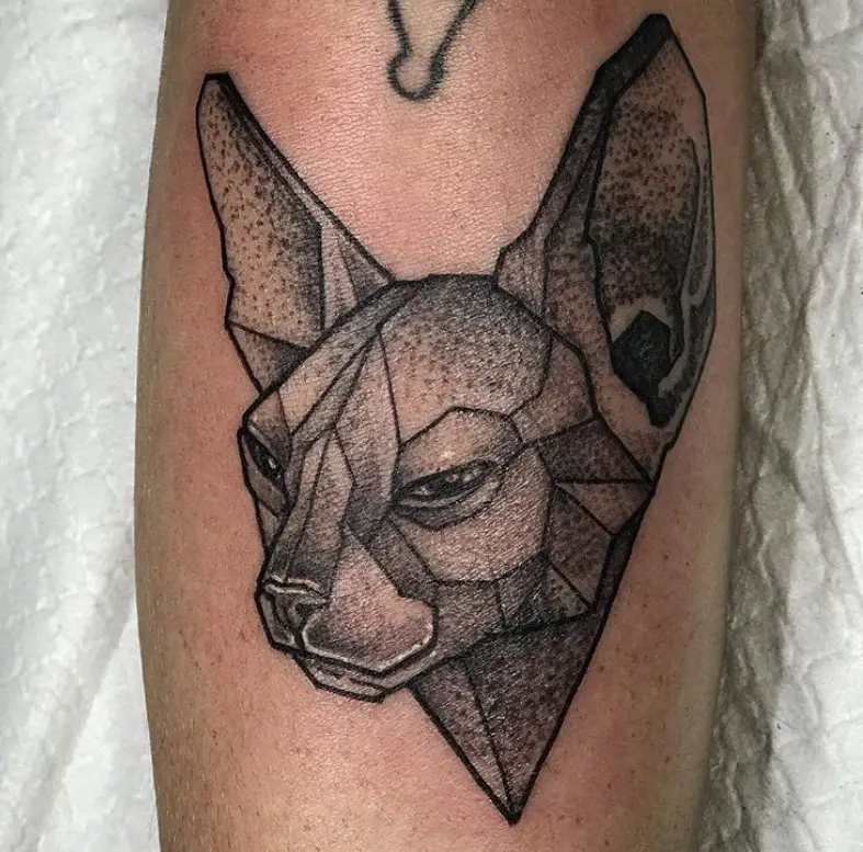 black and gray Geometric sideview face Cat Tattoo on the leg