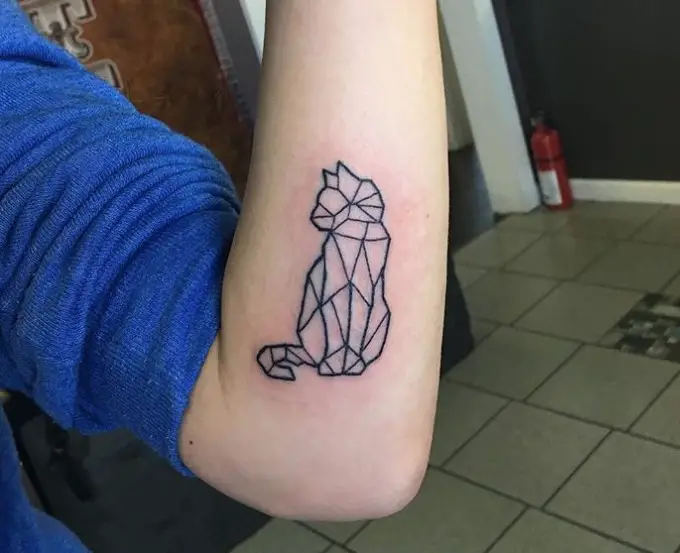 A Geometric Cat tattoo on the forearm
