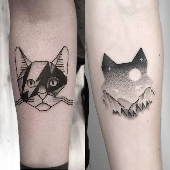 black and gray face of a Geometric Cat Tattoo on the forearm