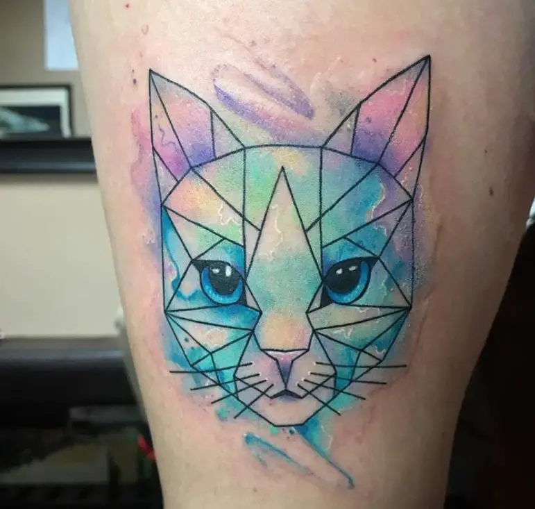 Geometric face of a Cat with watercolor Tattoo on thigh