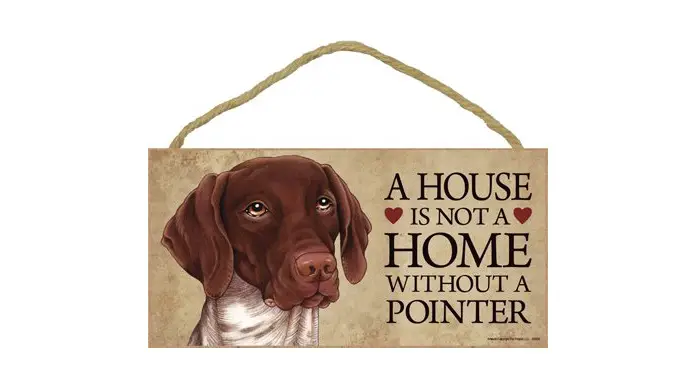 A wooden door sign with the face of a German Shorthaired Pointer and with saying - A house is not a home without a pointer