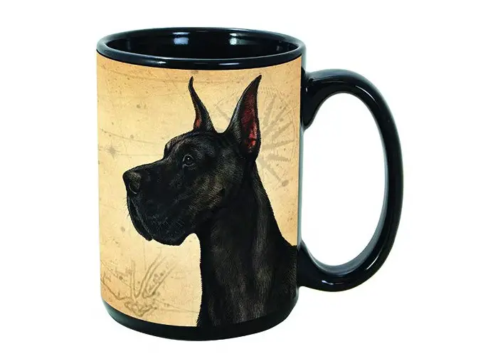 A black mug printed with a black Great Dane in a gold background
