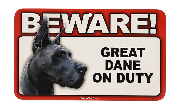 sign with the face of a black Great Dane and a text that says - Beware! Great Dane on Duty!
